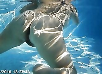 Big tits at the swimming pool