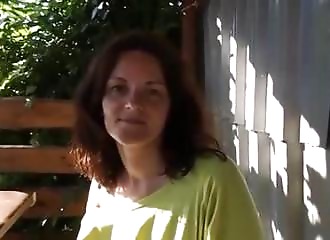 Mature Brunette shows her pussy at breakfast