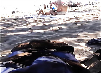 Pussy exposed on nudist beach